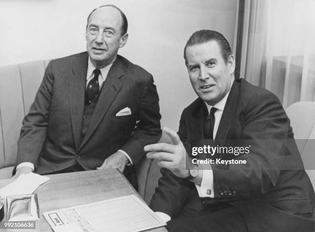 American diplomat Adlai Stevenson II , the US Ambassador to the United Nations, meets German Foreign Minister Gerhard Schröder for talks in Bonn,...