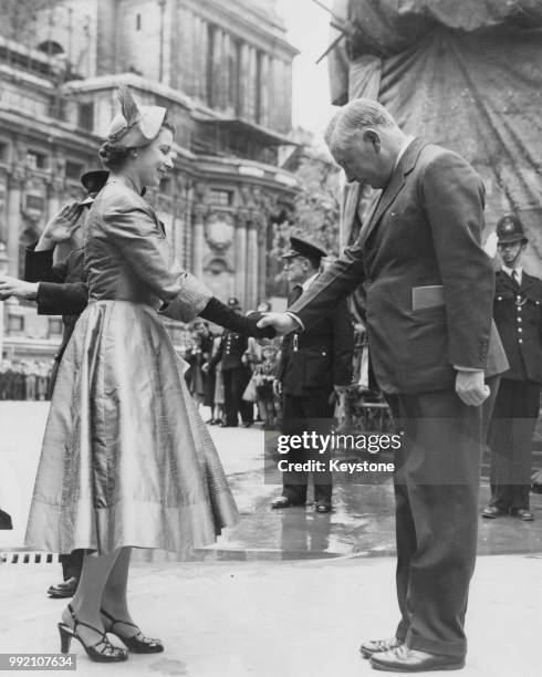Bernard Fitzalan-Howard, 16th Duke of Norfolk , the Earl Marshal, greets Queen Elizabeth II upon her arrival at Westminster Abbey in London for a...