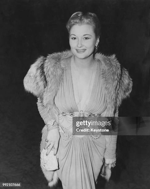 British actress Christine Norden arrives for the first night of the American National Ballet Theatre's season at the Royal Opera House in Covent...