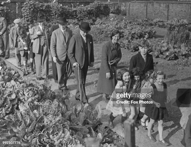 Bernard Fitzalan-Howard, 16th Duke of Norfolk visits a former children's playground in Bethnal Green, London, where the local people have dug up the...