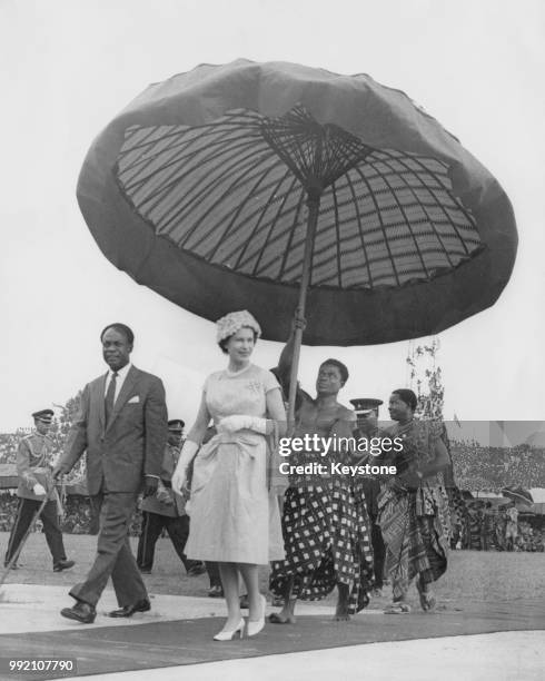 Queen Elizabeth II on her way to the Kumasi Durbah with Dr Kwame Nkrumah , President of Ghana, during her tour of Ghana, November 1961.