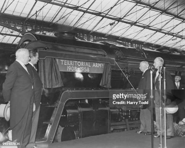 Bernard Fitzalan-Howard, 16th Duke of Norfolk unveils the new nameplate of 'Territorial Army', formerly Locomotive 70048, at Euston Station in...
