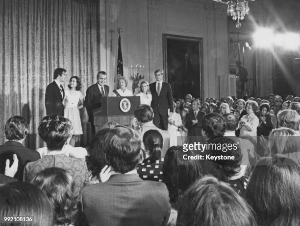 Richard Nixon receives a standing ovation from the staff at the White House upon his resignation as 37th President of the United States, Washington,...