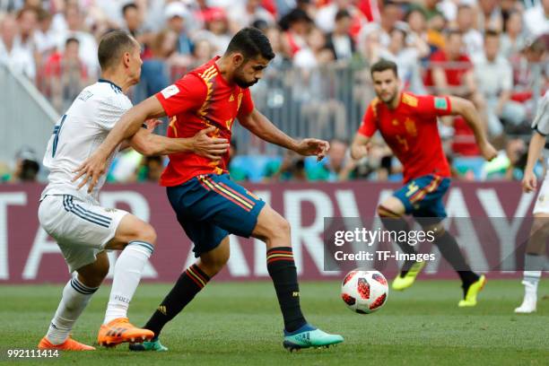 Diego Costa of Spain battle for the ball during the 2018 FIFA World Cup Russia match between Spain and Russia at Luzhniki Stadium on July 01, 2018 in...