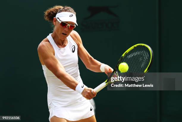 Samantha Stosur of Australia returns a shot against Daria Gavrilova of Australia during the Ladies' Singles second round match on day four of the...