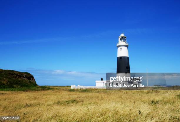 alderney lighthouse - guernsey stock-fotos und bilder