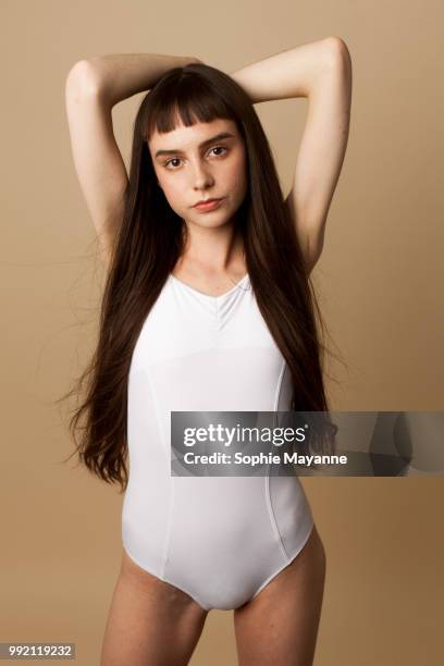 A young woman in the studio