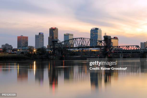 skyline of little rock and arkansas river - rainer grosskopf stock pictures, royalty-free photos & images