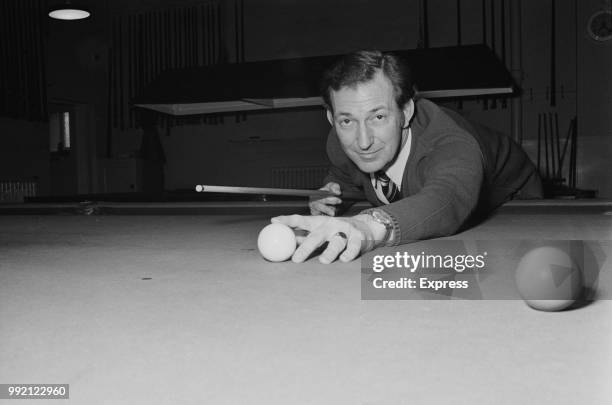 English referee Ken Burns playing pool, UK, 8th May 1973.