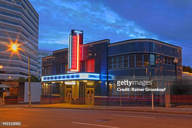 historic art deco greyhound bus station at night - rainer grosskopf stock pictures, royalty-free photos & images