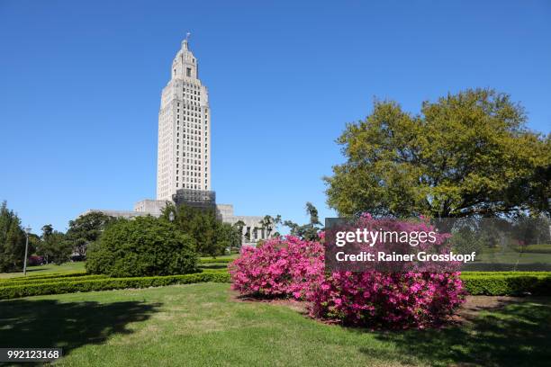 state capitol of louisiana with blooming azalea - rainer grosskopf stock pictures, royalty-free photos & images