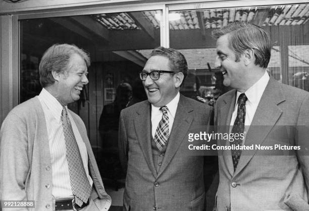From left to right, American President-elect Jimmy Carter, US Secretary of State Henry Kissinger and American Vice President-elect Walter Mondale...