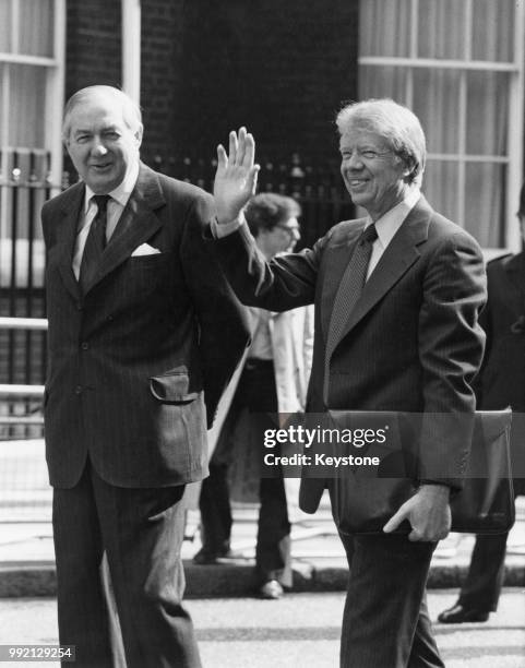 American President Jimmy Carter with British Prime Minister James Callaghan in Downing Street, London, during an international summit conference, May...