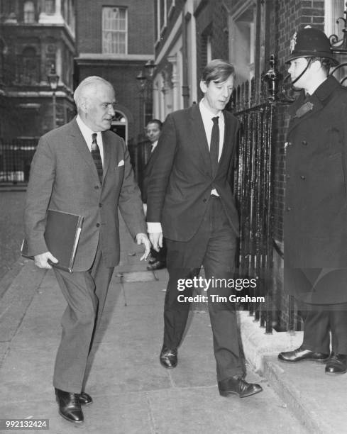 Michael Stewart , the Foreign Secretary, and Peter Shore , the Economic Secretary, arrive at 10 Downing Street for a cabinet meeting during the...