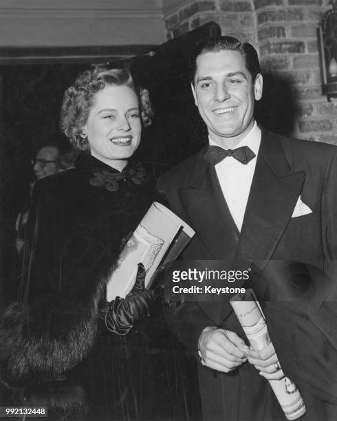 Canadian-born actress Alexis Smith and her husband, actor Craig Stevens at the premiere of the film 'The Paradine Case' in Westwood Village, Los...
