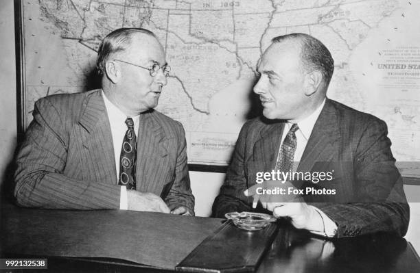 Donald M. Nelson , chairman of the US War Production Board, and Oliver Lyttelton , the British Minister of Production, begin a series of conferences...