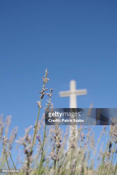 at the cross we find perfect peace. visiting valle de los caidos, spain. #cross #jesus #spain #laven - valle de los caidos stock pictures, royalty-free photos & images