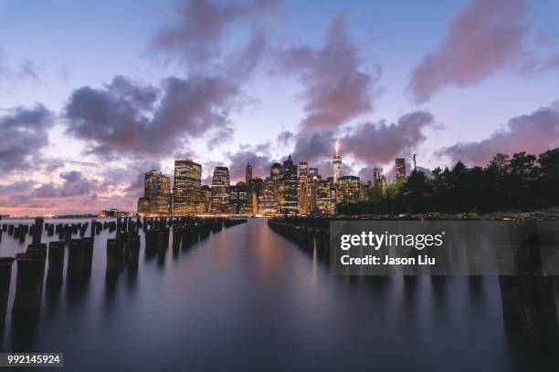 nyc sunset - jason liu stock pictures, royalty-free photos & images