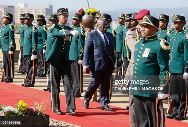 Ghana President Nana Akufo-Addo inspects a military honour guard at the Union Building in Pretoria, South Africa, on July 5 during his official state...