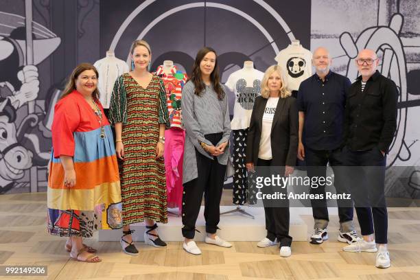 Rianna Kounou, Nina Kuhn, Otto Droegsler, Joerg Ehrlich, Micaela Sabatier and William Fan pose at the Disney X Der Berliner Salon show during 'Der...