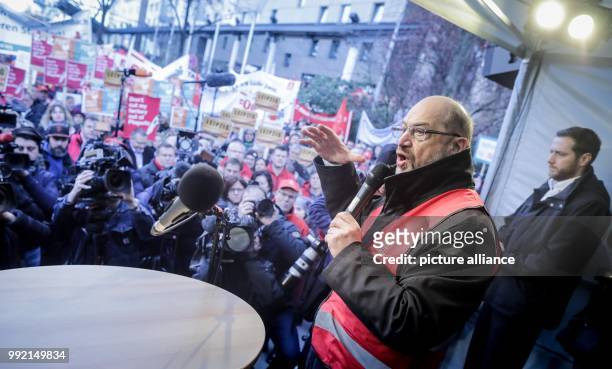 Leader of the Social Democratic Party of Germany , Martin Schulz, speaks to Siemens employees taking part in a protest against planned lay-offs...