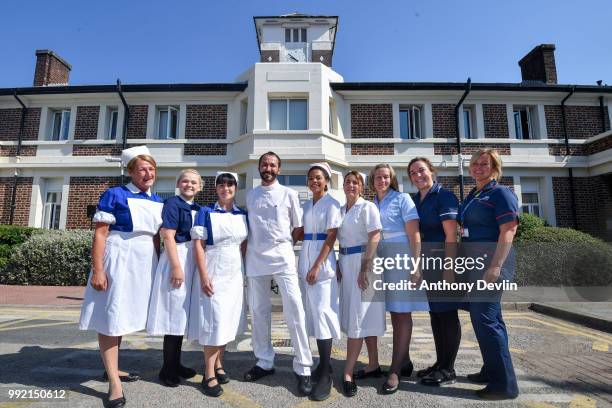 Nurses in uniforms to represent each decade of the NHS pose outside Trafford Hospital to celebrate the 70th birthday of the NHS at Trafford Hospital,...