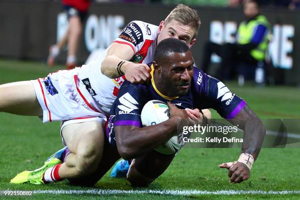 Suliasi Vunivalu of the Storm scores a try during the round 17 NRL match between the Melbourne Storm and the St George Illawarra Dragons at AAMI Park...