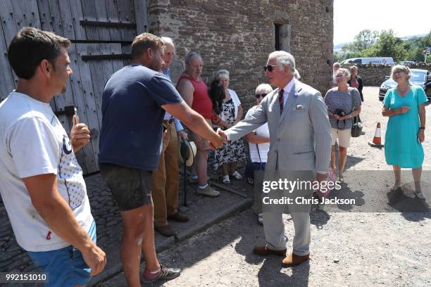 Prince Charles, Prince of Wales greets members of the public as he visits Tretower Court on July 5, 2018 in Crickhowell, Wales.