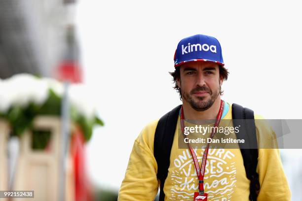 Fernando Alonso of Spain and McLaren F1 arrives at the circuit during previews ahead of the Formula One Grand Prix of Great Britain at Silverstone on...