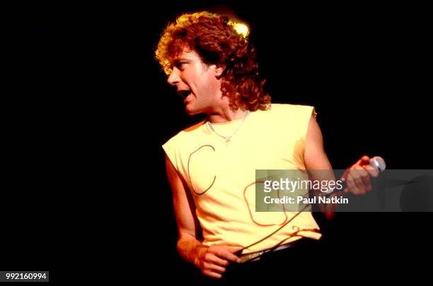 Singer Robert Plant performs on stage at the Rosemont Horizon in Rosemont, Illinois, September 10, 1985.