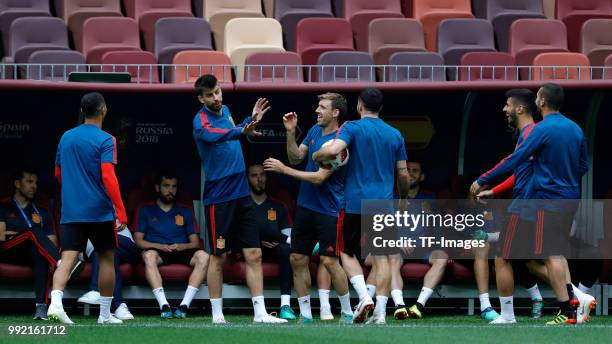 Players of Spain look on during a training session on June 30, 2018 in Moscow, Russia.