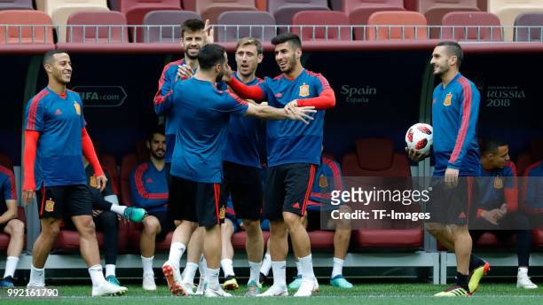 Players of Spain laugh during a training session on June 30, 2018 in Moscow, Russia.
