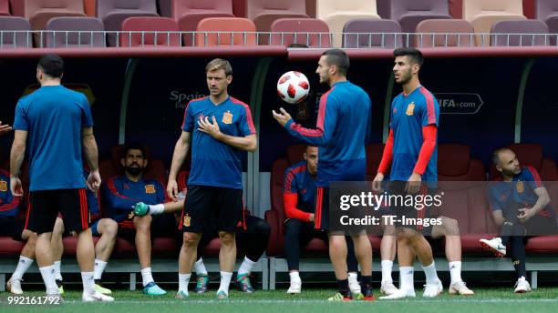 Players of Spain look on during a training session on June 30, 2018 in Moscow, Russia.