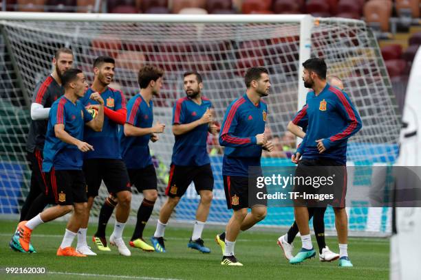 Players of Spain run during a training session on June 30, 2018 in Moscow, Russia.