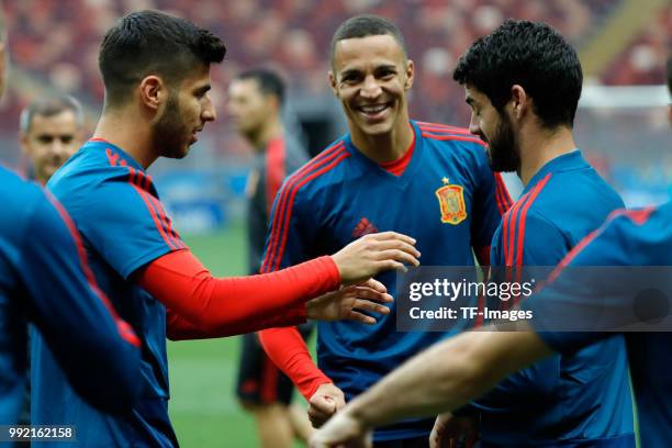 Players of Spain laugh during a training session on June 30, 2018 in Moscow, Russia.