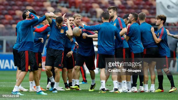 Players of Spain gesture during a training session on June 30, 2018 in Moscow, Russia.