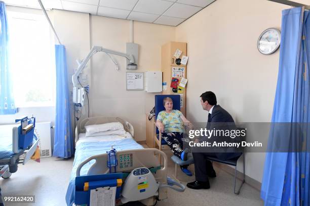 Mayor of Manchester Andy Burnham meets patient Kathleen Henry on Ward 6, where Health Minister Aneurin Bevan met the first NHS patient in 1948,...