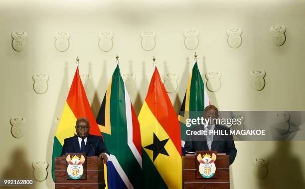 Ghana President Nana Akufo-Addo and South African President Cyril Ramaphosa address a joint press conference following their meeting at the Union...