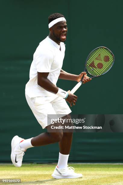 Frances Tiafoe of the United States reacts against Julien Benneteau of France during their Men's Singles second round match on day four of the...