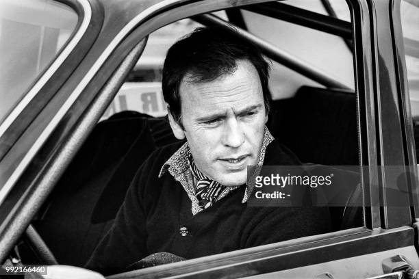 Portrait taken on April 14, 1973 shows French actor Jean-Louis Trintignant driving a car.