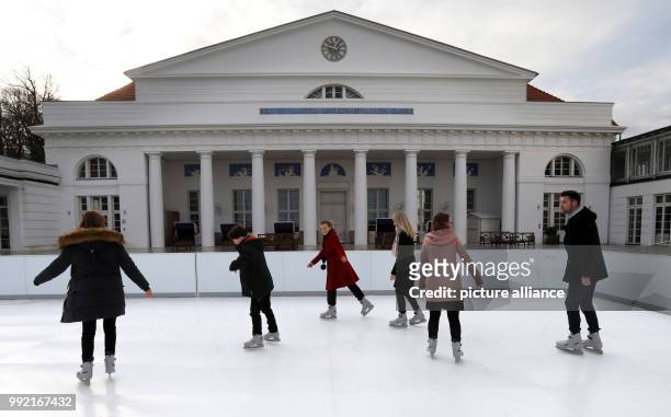 Employees test an artificial ice rink at the Grand Hotel in Heiligendamm, Germany, 24 November 2017. The 200 square meter rink made from synthetical...