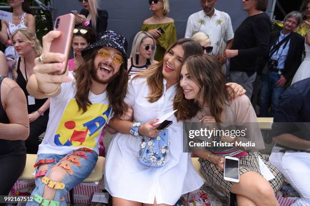 Riccardo Simonetti, Farina Opoku and Masha Sedgwick attend the Marina Hoermanseder show during the Berlin Fashion Week Spring/Summer 2019 at ewerk on...