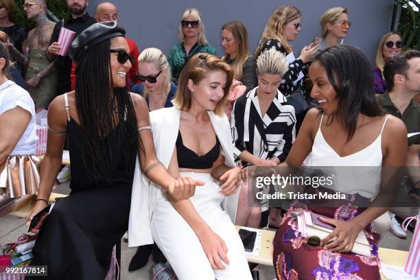 Lary Poppins, Lisa-Marie Koroll and Sara Nuru attend the Marina Hoermanseder show during the Berlin Fashion Week Spring/Summer 2019 at ewerk on July...