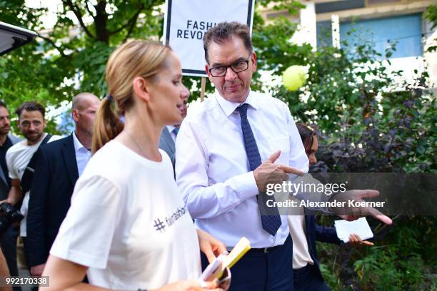 Andrea Ebinger of Detlef Braun and Minister Dr. Gerd Mueller speak during a discussion panel at the Greenshowroom Fair Fashion Move on July 5, 2018...