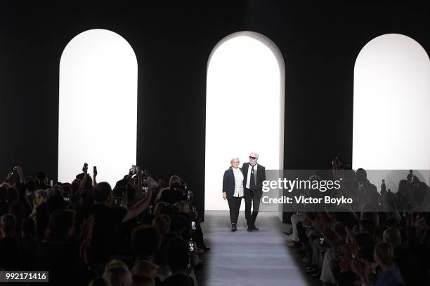 Silvia Venturini Fendi and Karl Lagerfeld walk the runway during the finale of the Fendi Couture Haute Couture Fall Winter 2018/2019 show as part of...