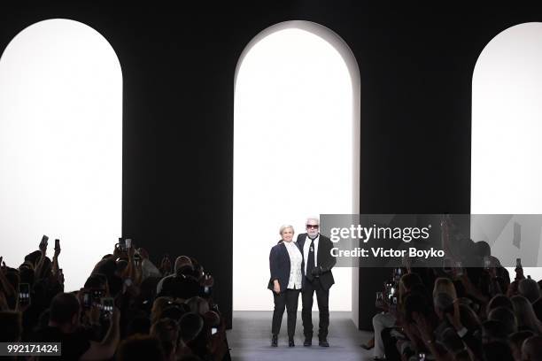 Silvia Venturini Fendi and Karl Lagerfeld walk the runway during the finale of the Fendi Couture Haute Couture Fall Winter 2018/2019 show as part of...