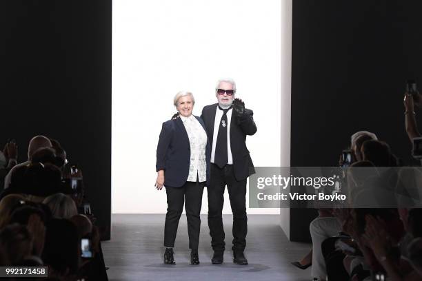 Silvia Venturini Fendi and Karl Lagerfeld walk the runway during the finale of the Fendi Couture Haute Couture Fall Winter 2018/2019 show as part of...