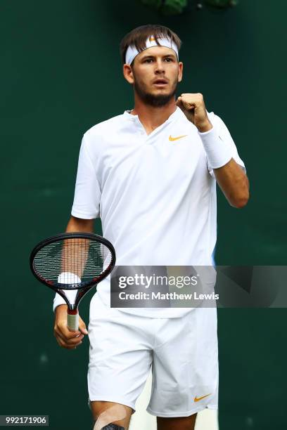 Jared Donaldson of the United States celebrates a point against Stefanos Tsitsipas of Greece during their Men's Doubles first round match on day four...
