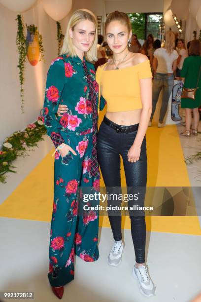 July 2018, Berlin, Germany: Models Kim Hnizdo and Elena Carriere arrive at the Fashion Hub breakfast held in the Ellington Hotel. Collections for...