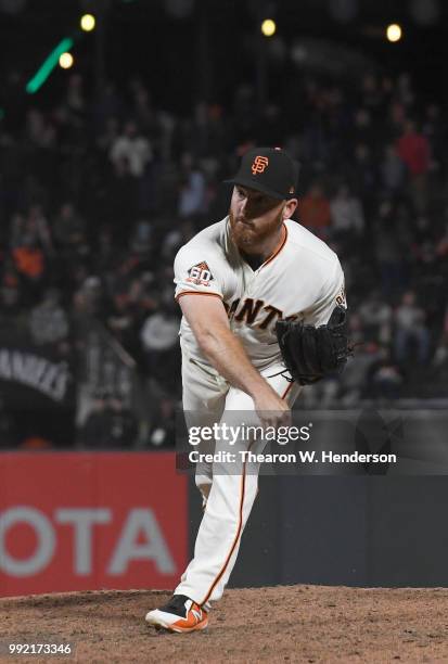 Sam Dyson of the San Francisco Giants pitches against the Colorado Rockies in the ninth inning at AT&T Park on June 26, 2018 in San Francisco,...